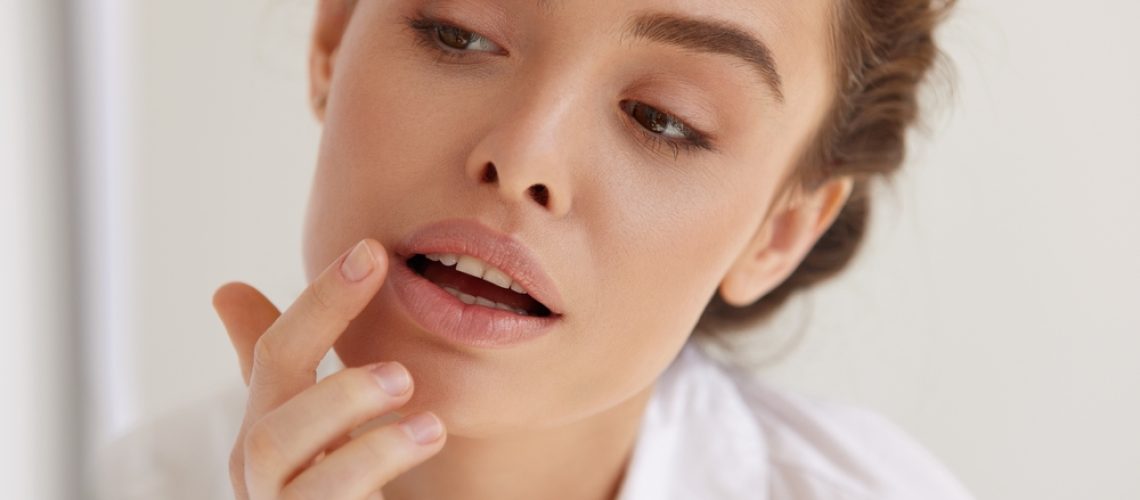 Lips,Skin,Care.,Female,Applying,Hygienic,Lip,Balm.,Young,Girl